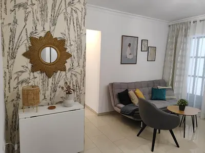 Zona de estar de Nieves Viejas Apartamento Fresco con patio en Córdoba