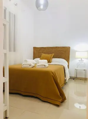Cama o camas de una habitación en Nieves Viejas Apartamento Fresco con patio en Córdoba
