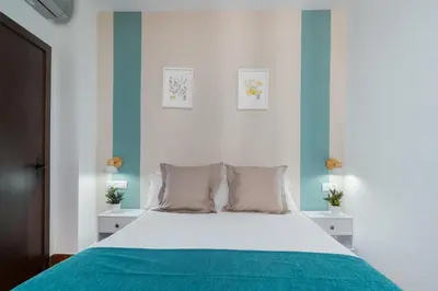Cama o camas de una habitación en Hotel Boutique Puerta del Rincón