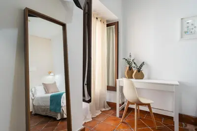 Cama o camas de una habitación en Hotel Boutique Puerta del Rincón