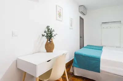 Cama o camas de una habitación en Hotel Boutique Puerta del Rincón