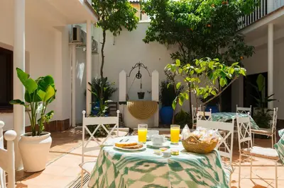 Zona de estar de Hotel Boutique Puerta del Rincón