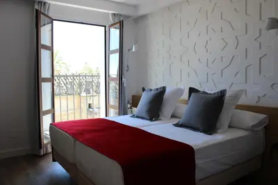 Cama o camas de una habitación en Hotel Boutique Caireles