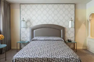 Cama o camas de una habitación en Hotel Macià Alfaros