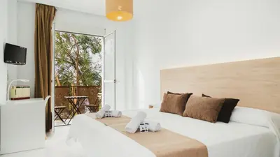 Cama o camas de una habitación en Hotel Olive
