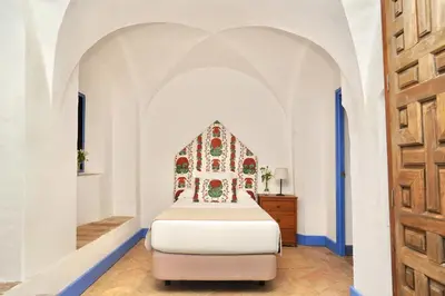 Cama o camas de una habitación en Monasterio de San Francisco