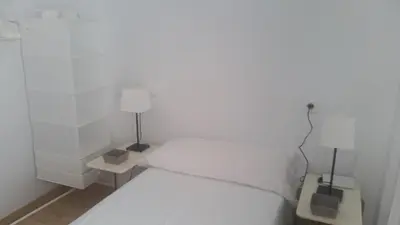 Cama o camas de una habitación en Acogedor dúplex en el centro - Wifi