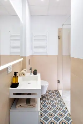 Un baño de One&lux Puerta Osario