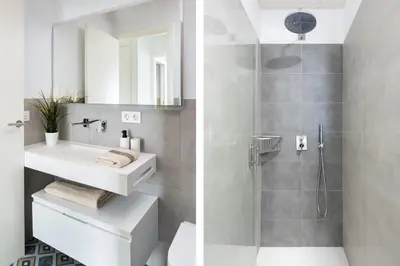 Un baño de One&lux Puerta Osario