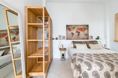 Cama o camas de una habitación en Oasis con encanto en el corazón de Sevilla