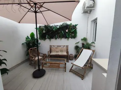 Zona de estar de Oasis con encanto en el corazón de Sevilla
