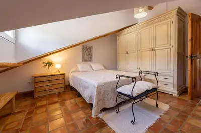 Cama o camas de una habitación en Vivienda Rural Las Bartolas
