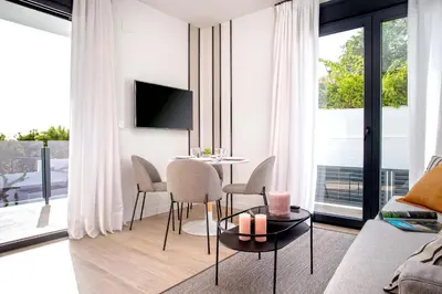 Una televisión o centro de entretenimiento en Genteel Home Arruzafa