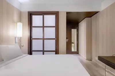 Cama o camas de una habitación en AC Hotel Córdoba by Marriott