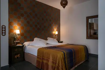 Cama o camas de una habitación en Alcoba del Rey de Sevilla
