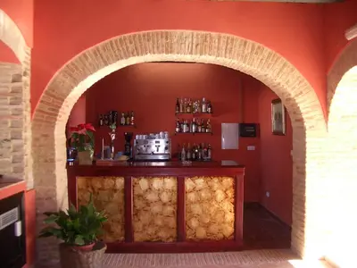 El salón o zona de bar de Hacienda Los Jinetes