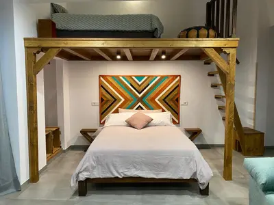 Cama o camas de una habitación en Apartamentos La Cámara II Córdoba Corredera