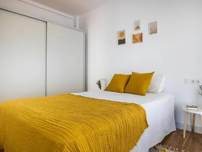 Cama o camas de una habitación en Gran plaza home - Vacacional Sevilla