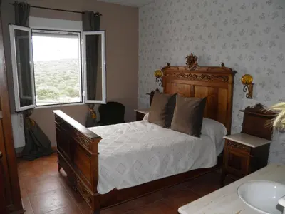 Cama o camas de una habitación en LA GINETA