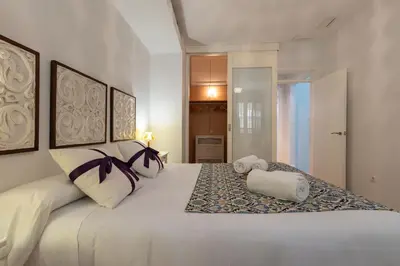 Cama o camas de una habitación en Descalzos city center by Valcambre