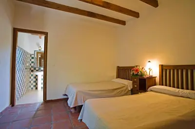Cama o camas de una habitación en Villa El Lagar Rocabella