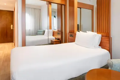 Cama o camas de una habitación en Exe Sevilla Macarena