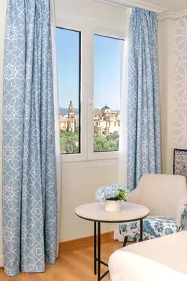 Cama o camas de una habitación en Hesperia Córdoba