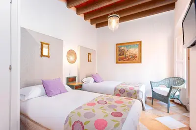Cama o camas de una habitación en Genteel Home Campamento