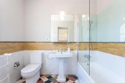 Un baño de Genteel Home Campamento