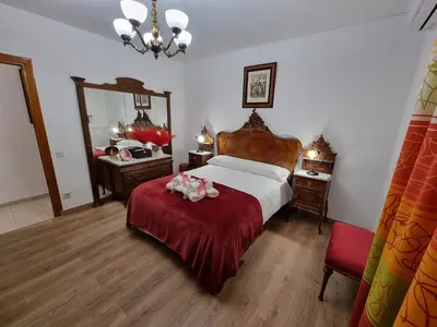 Cama o camas de una habitación en LA FUENTE ROMANA