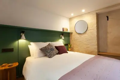 Cama o camas de una habitación en Duplex en el casco antiguo de Sevilla