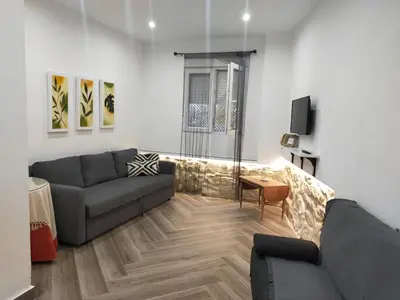 Zona de estar de APARTAMENTOS FERNANDO III EL SANTO