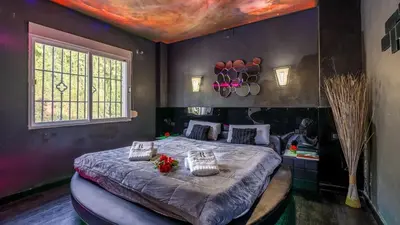 Cama o camas de una habitación en Villa de los Sueños Atarfe by Ruralidays