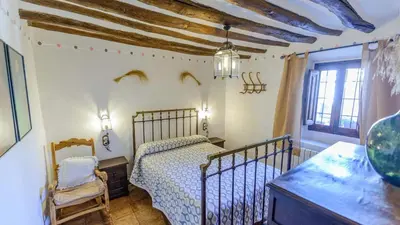 Cama o camas de una habitación en El Morrón Algarinejo by Ruralidays