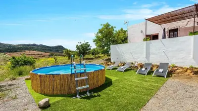 Piscina en o cerca de La Casita del Sabinal Álora by Ruralidays