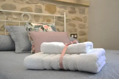 Cama o camas de una habitación en Apartamentos Turísticos El AOVE