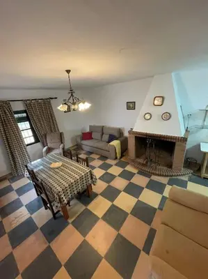 Zona de estar de Villa María, casa rural en Cazalla de la Sierra.