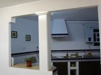Una cocina o zona de cocina en Al pie del Camarín con parking gratis