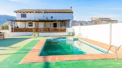 Piscina en o cerca de Cortijo Vaquero Rural Loja by Ruralidays