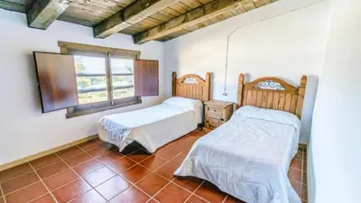 Cama o camas de una habitación en Cortijo Vaquero Rural Loja by Ruralidays