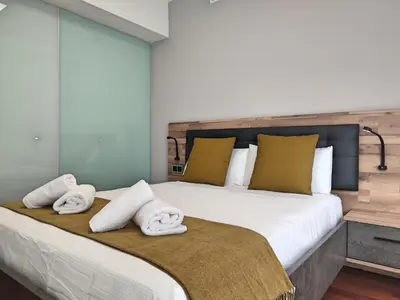 Cama o camas de una habitación en Victoria Cordoba Center