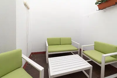 Zona de estar de Alohamundi Feria
