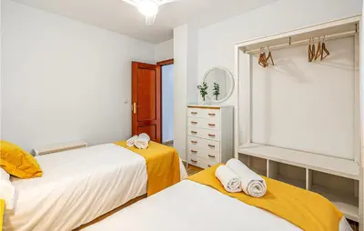 Cama o camas de una habitación en Stunning Air Conditioned House