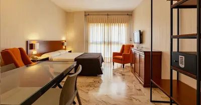 Cama o camas de una habitación en Apartamentos Vértice Bib Rambla