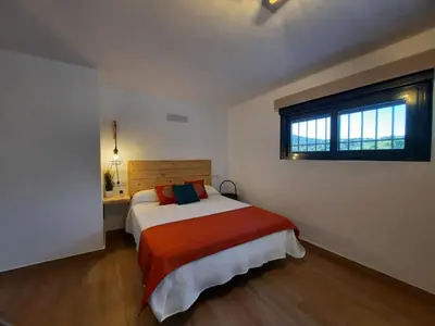 Cama o camas de una habitación en La Garzona