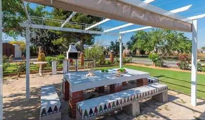 Jardín al aire libre en VILLA CUQUI