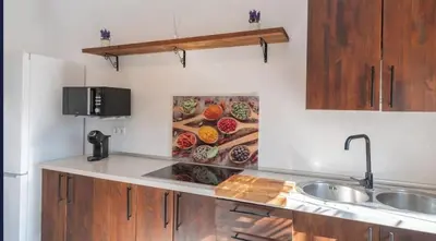 Una cocina o zona de cocina en VILLA CUQUI