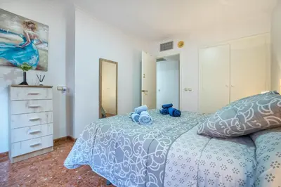 Cama o camas de una habitación en La Perla del Centro
