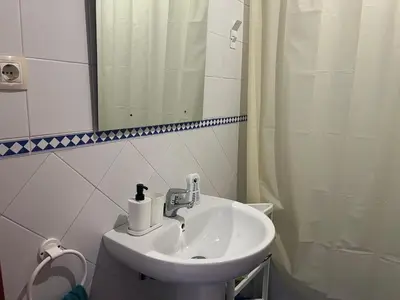 Un baño de Apartamento lux capilla