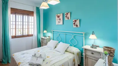 Cama o camas de una habitación en Casa Cuatro Vientos Almogía by Ruralidays
